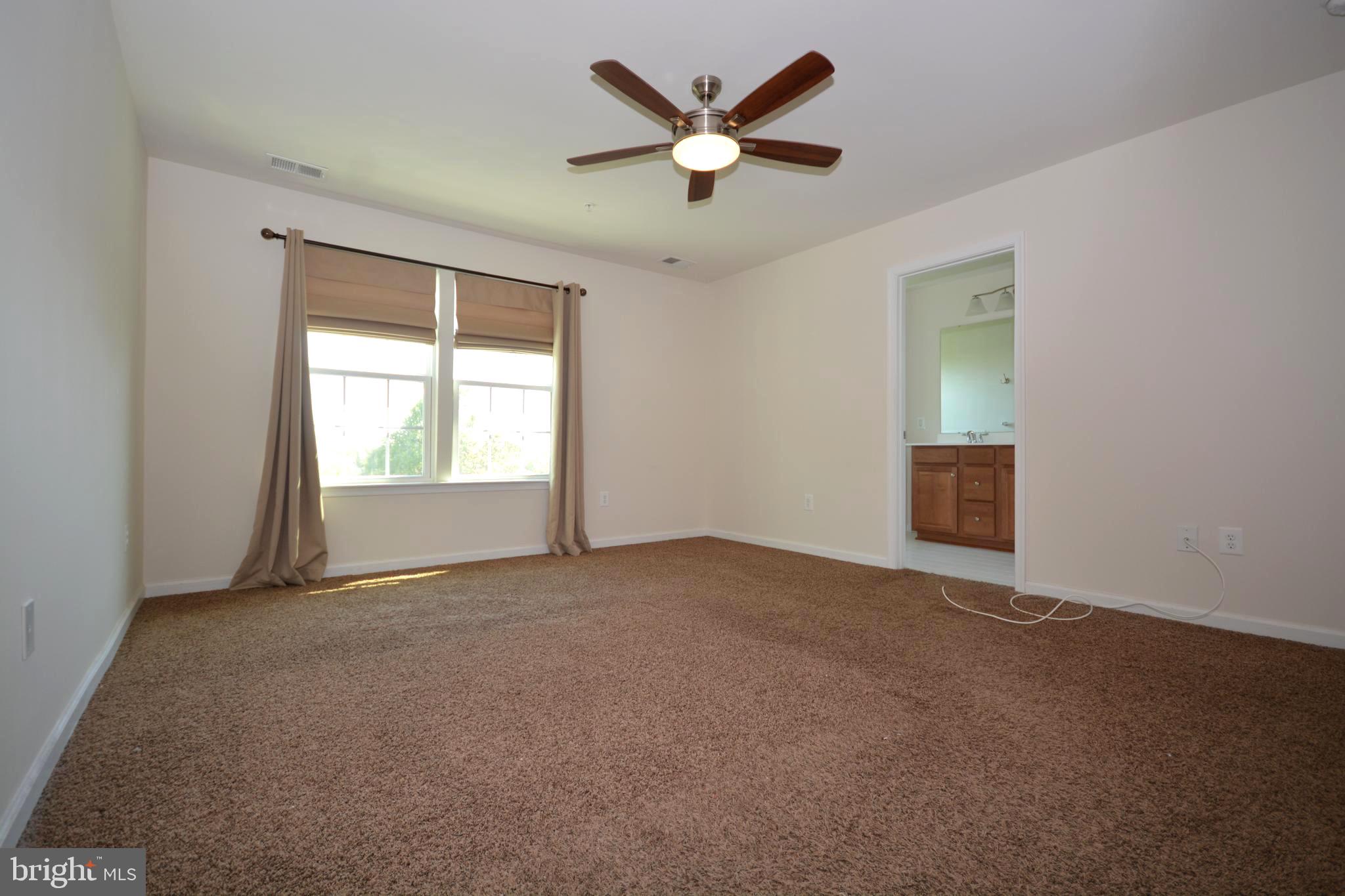 4975 Small Gains Way Frederick, MD 21703 - Photo 14 of 31 Primary Bedroom