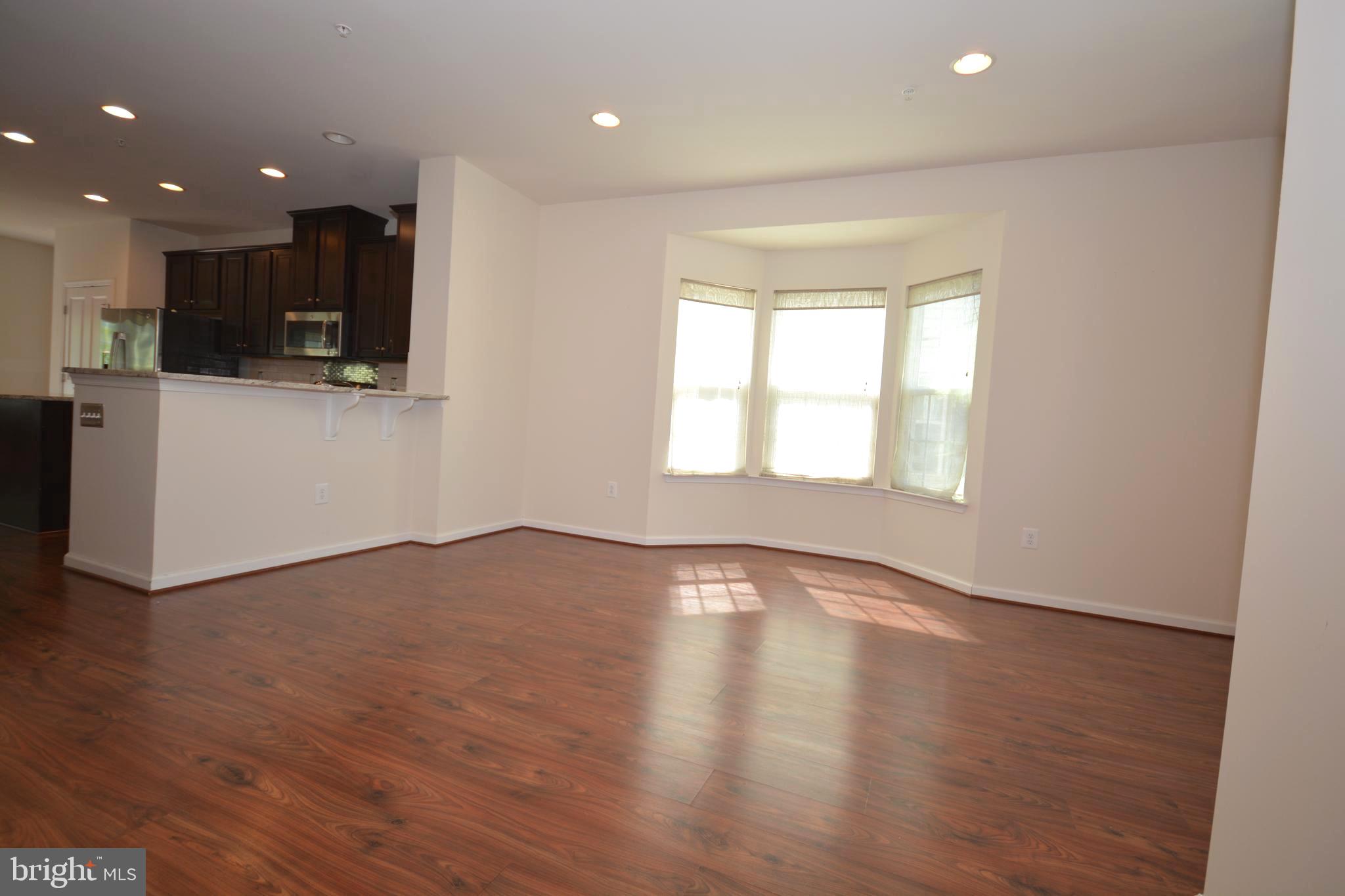 4975 Small Gains Way Frederick, MD 21703 - Photo 7 of 31 Living Room