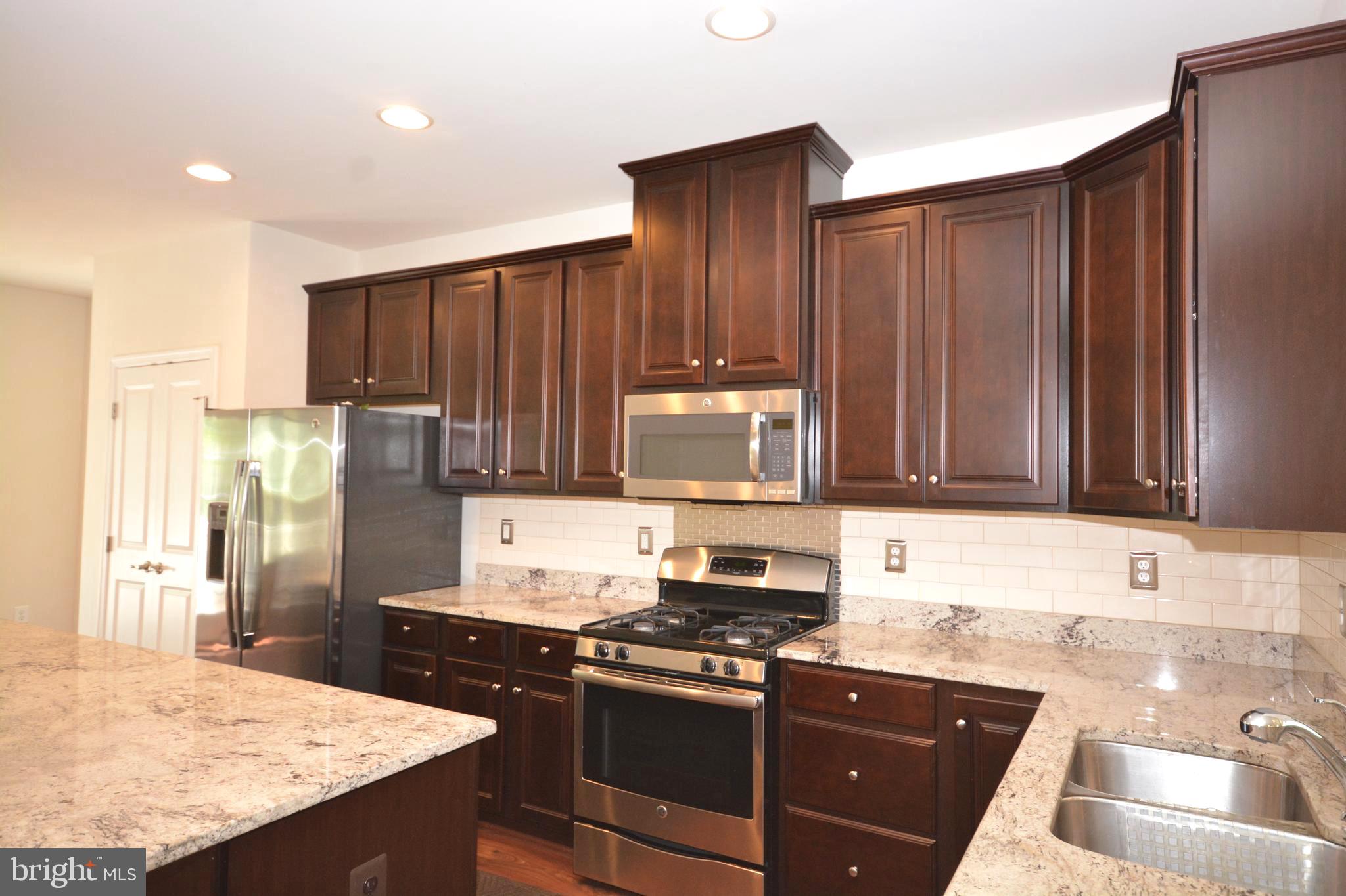 4975 Small Gains Way Frederick, MD 21703 - Photo 9 of 31 Granite Counter Tops