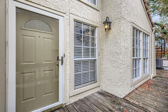 a view of a door and wooden door