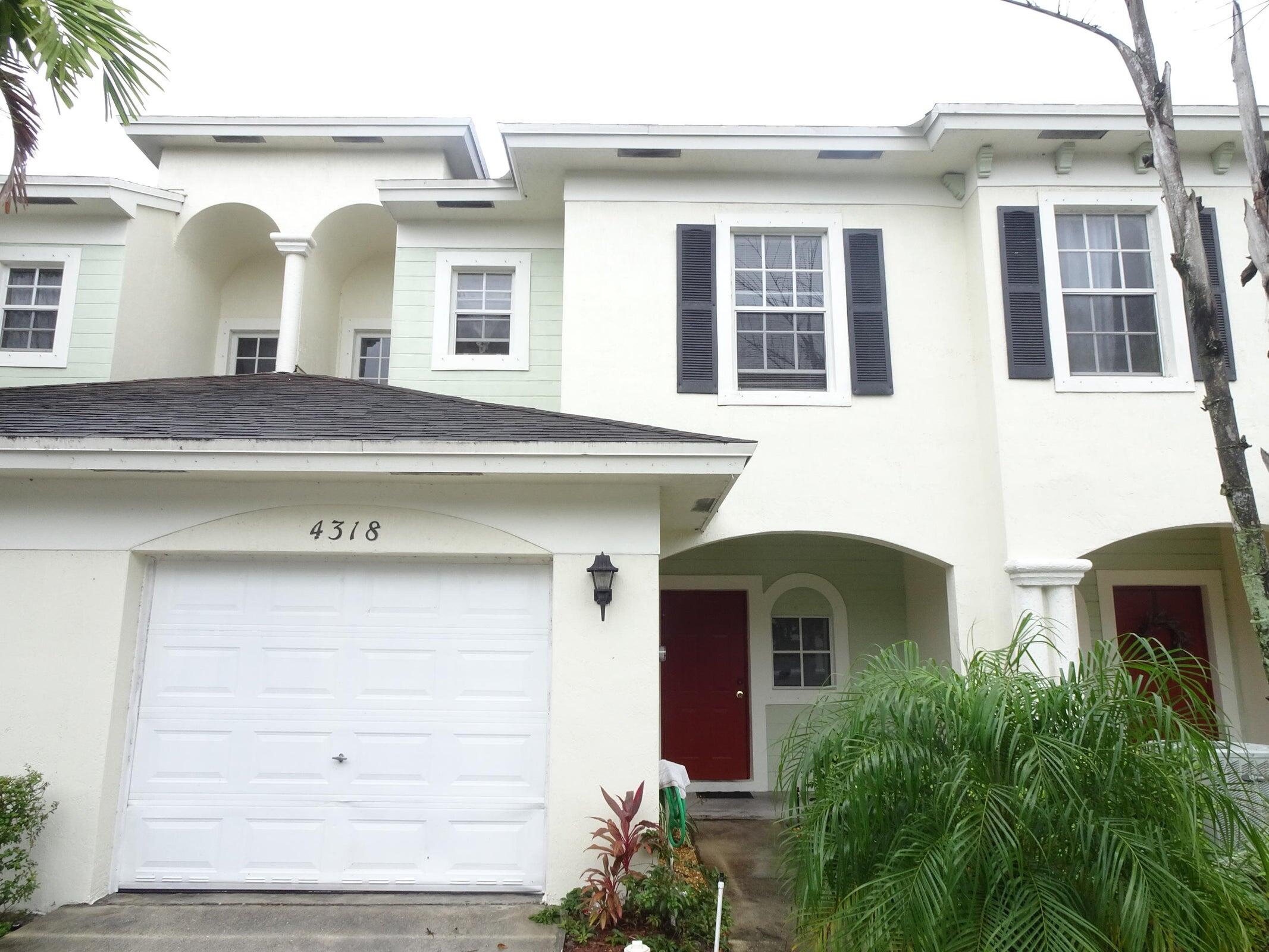 a front view of a house with balcony