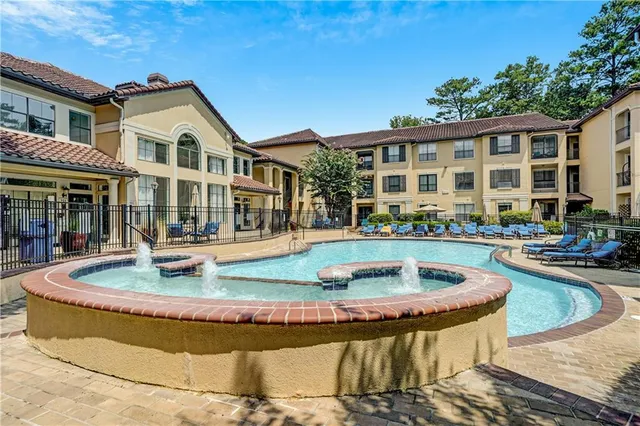 a front view of a house with swimming pool