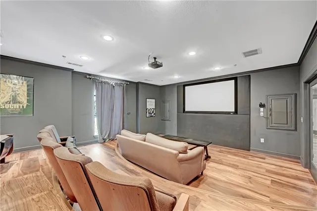 a room with a bed and a dresser