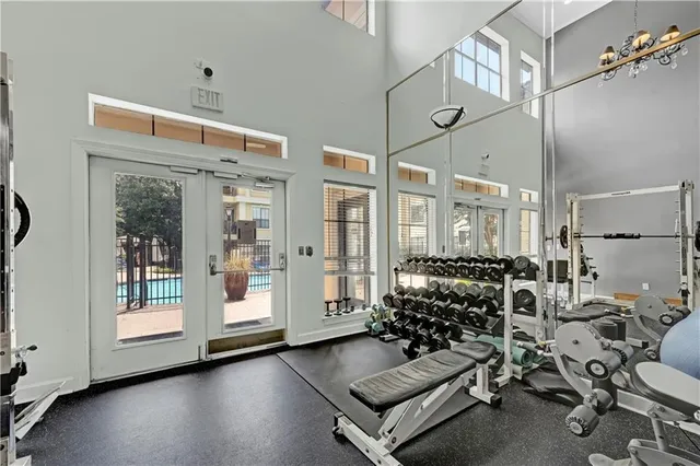 a living room with furniture window and wooden floor