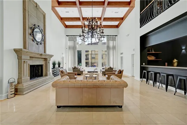 a living room with fireplace furniture and a flat screen tv