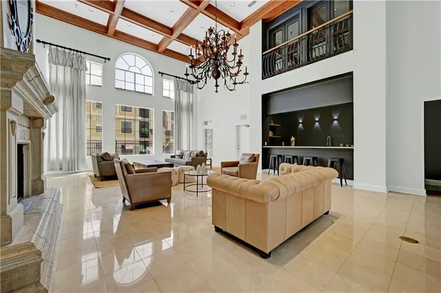 a living room with fireplace furniture and a flat screen tv
