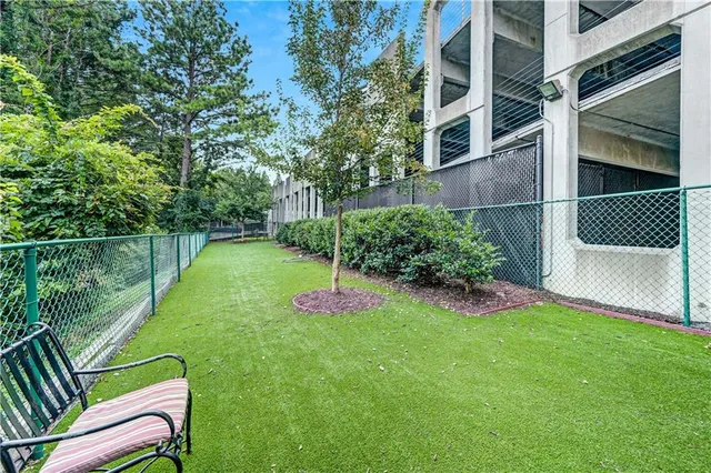 a view of a garden from a balcony