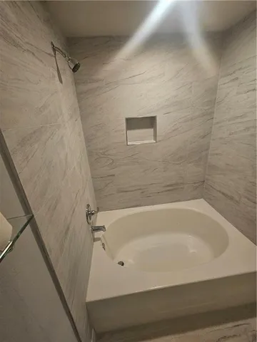 a bathroom with a bathtub