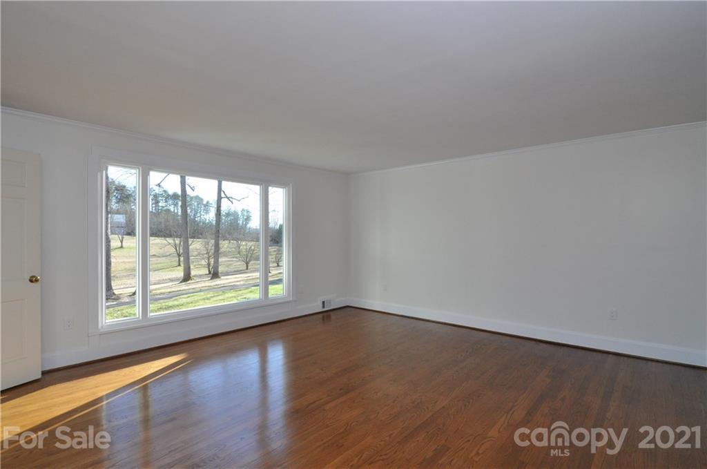 1011 Redland Road Landrum, SC 29356 - Photo 20 of 45 a view of an empty room with a window