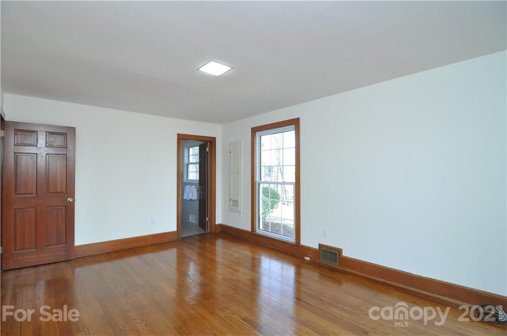 1011 Redland Road Landrum, SC 29356 - Photo 35 of 45 wooden floor in an empty room with a window