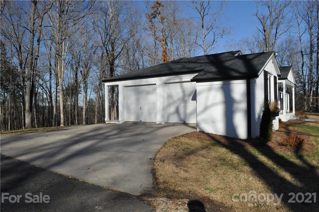 1011 Redland Road Landrum, SC 29356 - Photo 6 of 45 a view of a black gate