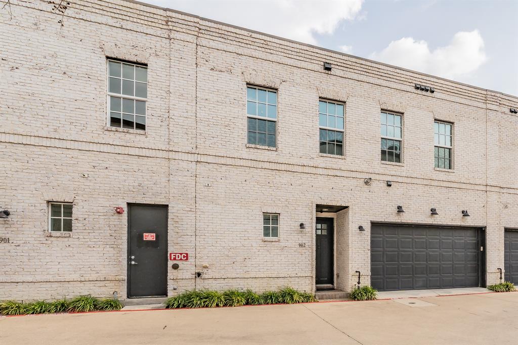7333 Valley View Lane, Unit 902 Dallas, TX 75240 - Photo 35 of 40 front view of a brick house