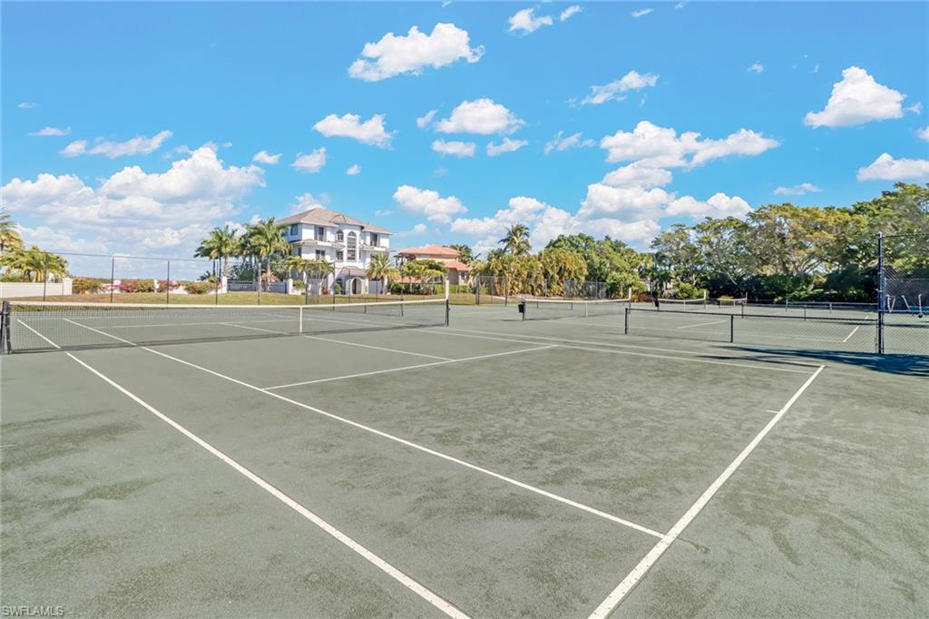 400 La Peninsula Boulevard, Unit 404 Naples, FL 34113 - Photo 18 of 19 a view of a tennis court