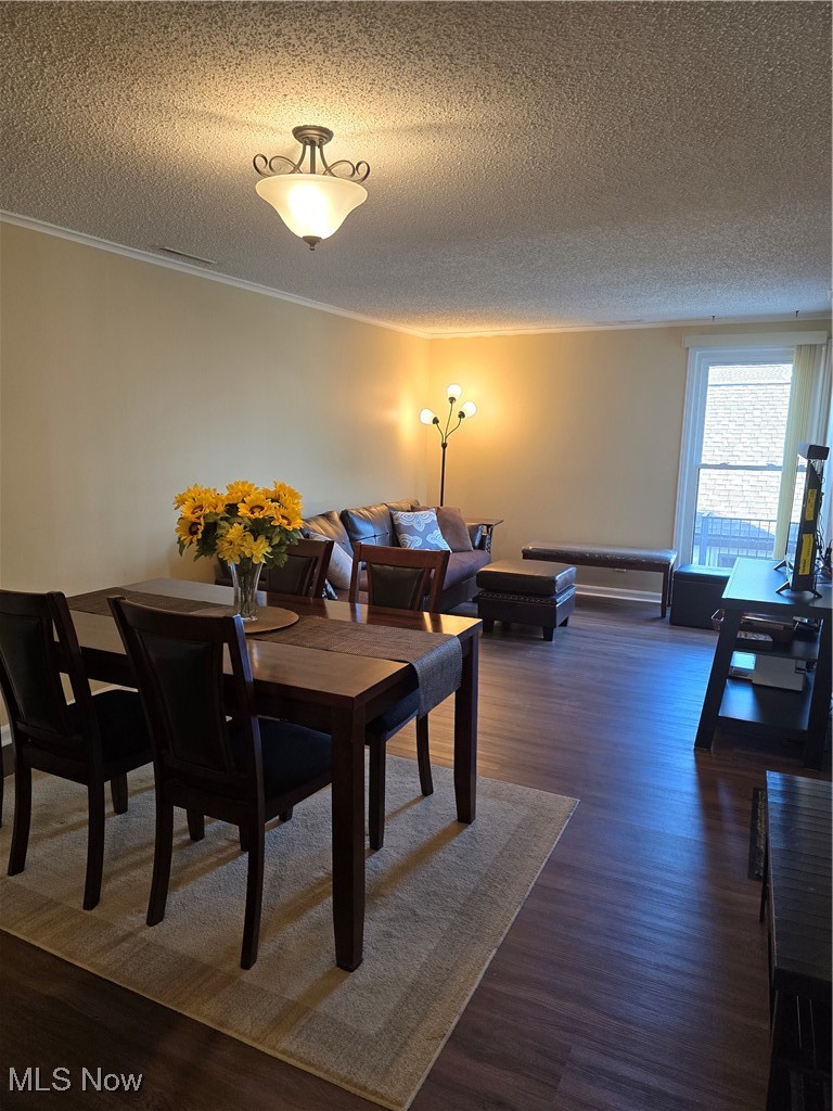 994 Som Center Road, Unit D2 Cleveland, OH 44143 - Photo 4 of 20 Large, open combo dining/sitting room featuring sliding door to deck