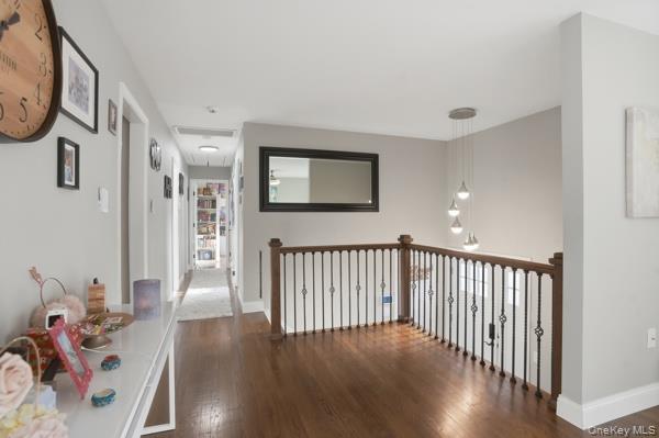 31 Laura Road Monroe, NY 10950 - Photo 27 of 39 a view of a hallway with wooden floor and a potted plant