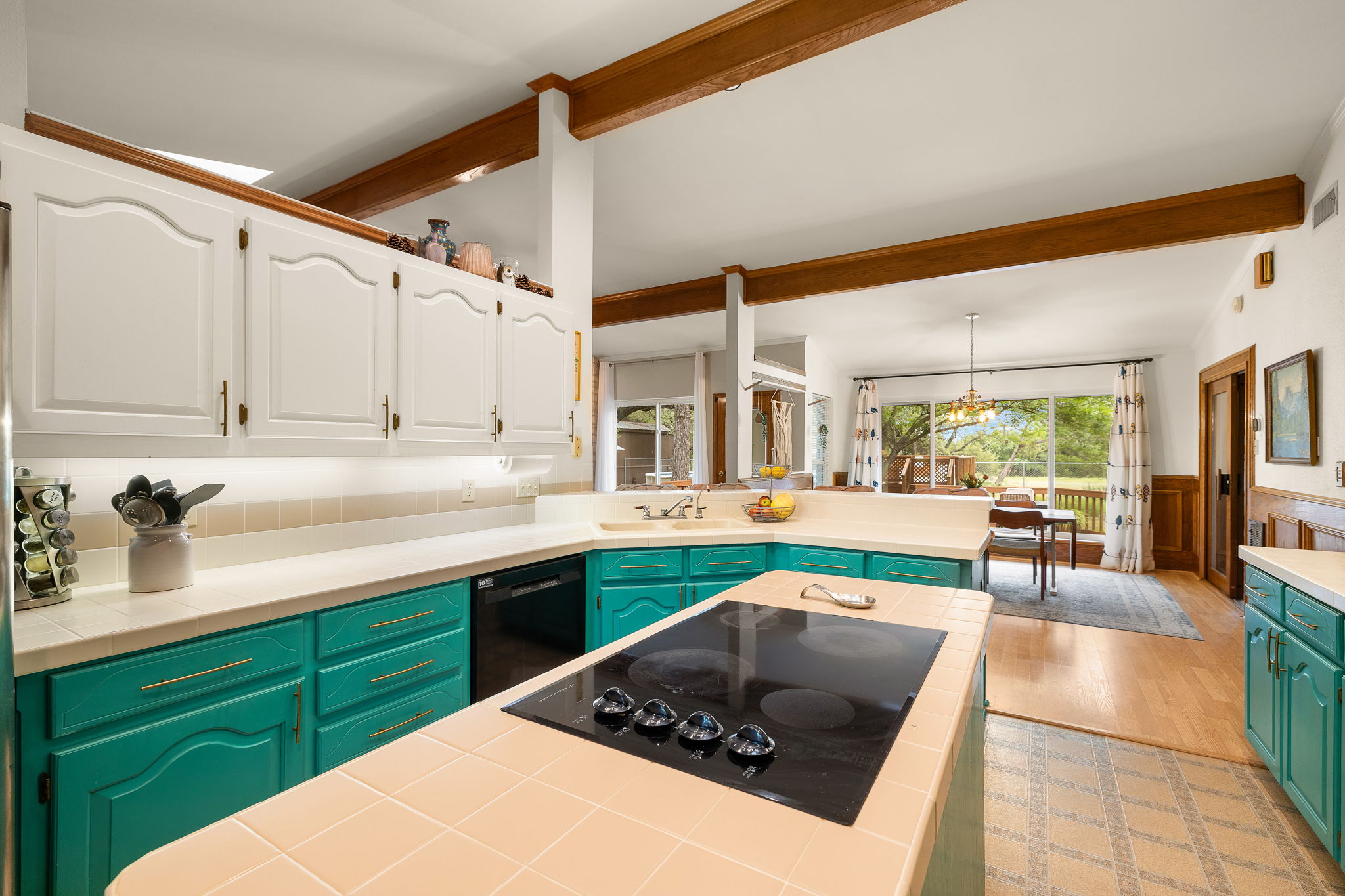 136 Valley View Road Georgetown, TX 78633 - Photo 6 of 40 This sunny kitchen not only has natural light from the massive windows in the dining room but also a skylight right over the island!