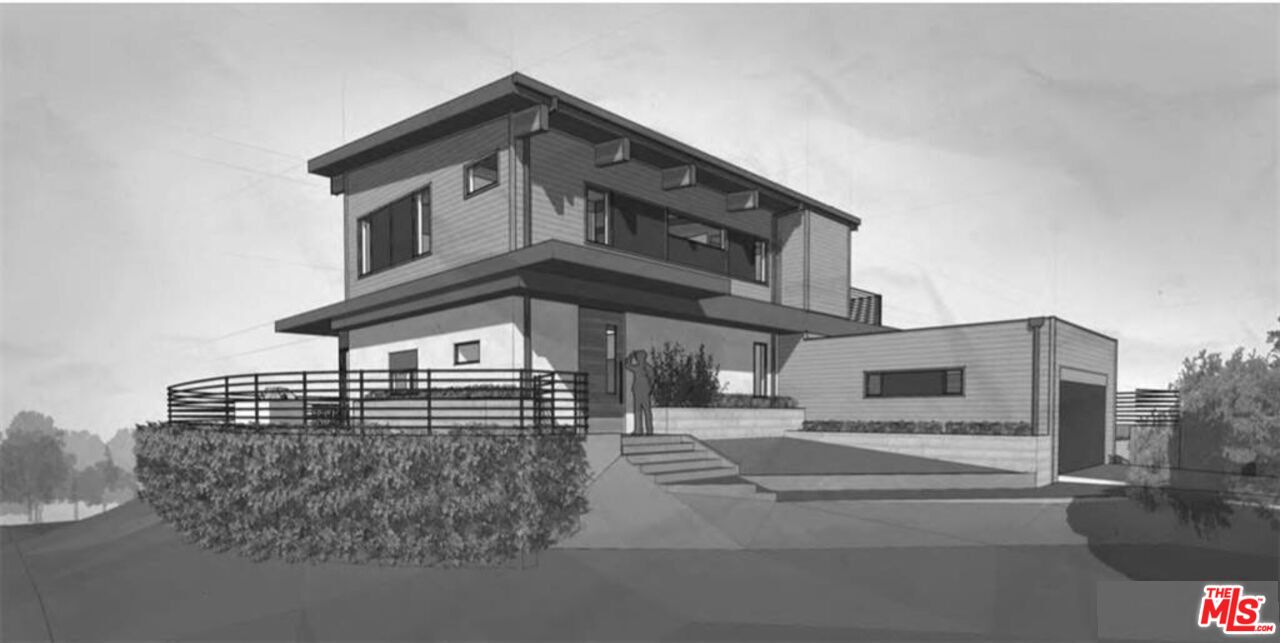 661 Cold Canyon Road Calabasas, CA 91302 - Photo 2 of 6 a view of a house with a street