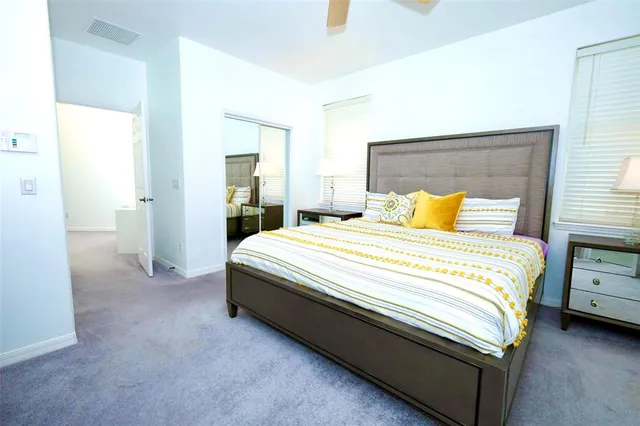 a white bath tub sitting next to a white toilet