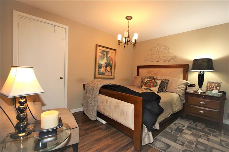 111 Taylor Run Road Monongahela, PA 15063 - Photo 14 of 25 Nice 13x12 Lower Level Bedroom in In-Law Suite w/ Pergo Flooring & Door to MASSIVE 13x8 Walk-in Closet
