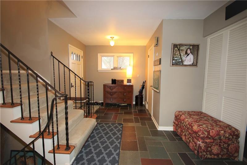 111 Taylor Run Road Monongahela, PA 15063 - Photo 6 of 25 MASSIVE 15x12 Entry offering Very Large Coat Closet & Slate Floors. Wide Steps leading both upstairs to Bedrooms & Downstairs to In-Law Suite / Game Room!