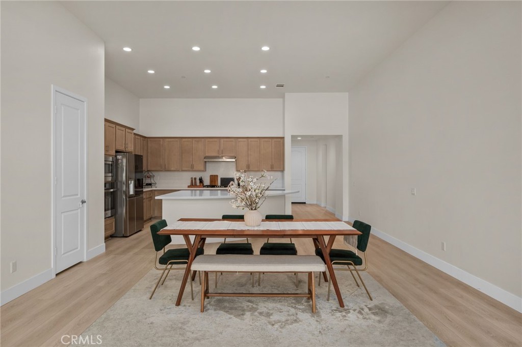 34972 South Serrano Square Yucaipa, CA 92399 - Photo 10 of 48 a view of a dining room with furniture
