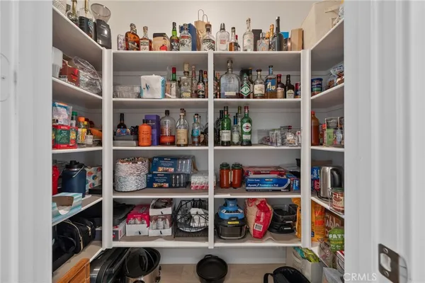 a kitchen with stainless steel appliances and cabinets
