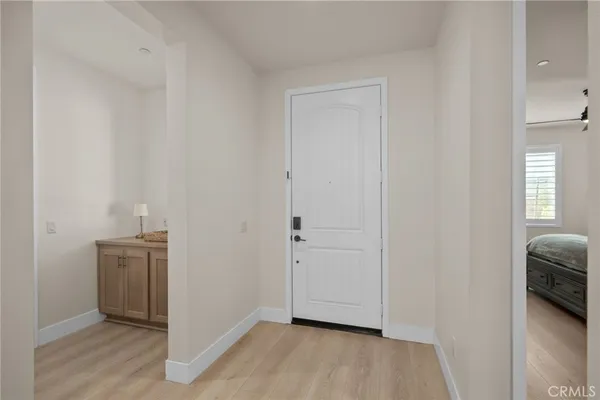 a room with a book shelf and a book shelf
