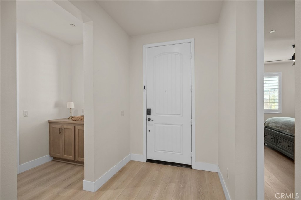 34972 South Serrano Square Yucaipa, CA 92399 - Photo 16 of 48 wooden floor and closet in a room