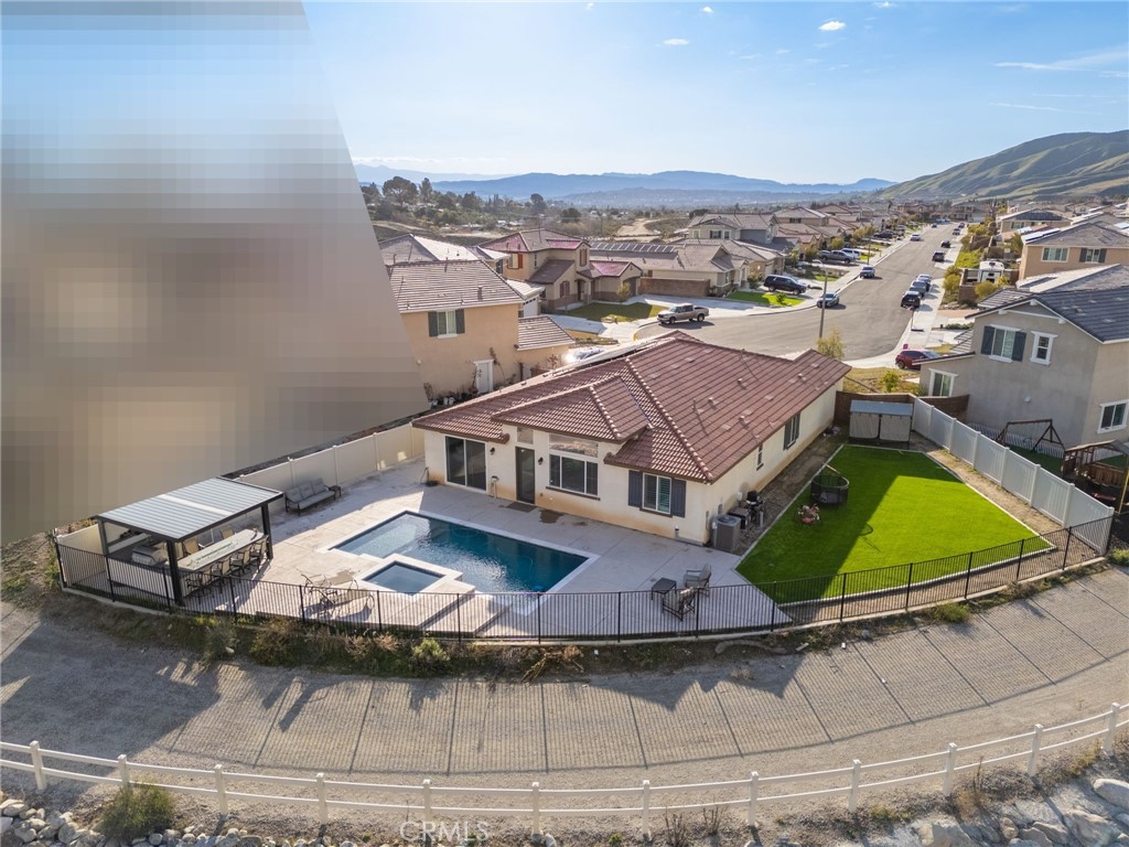 34972 South Serrano Square Yucaipa, CA 92399 - Photo 2 of 48 an aerial view of residential houses with outdoor space