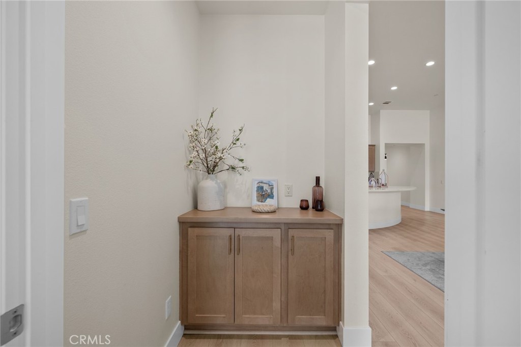 34972 South Serrano Square Yucaipa, CA 92399 - Photo 21 of 48 a bathroom with a sink and a mirror