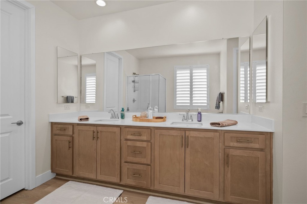 34972 South Serrano Square Yucaipa, CA 92399 - Photo 26 of 48 a view of two sink and mirror