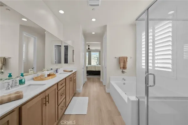 a bathroom with a bathtub and a shower