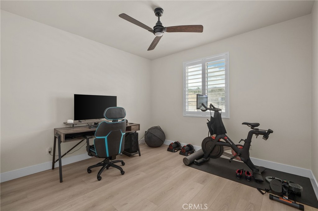 34972 South Serrano Square Yucaipa, CA 92399 - Photo 35 of 48 a view of a workspace with furniture and a window
