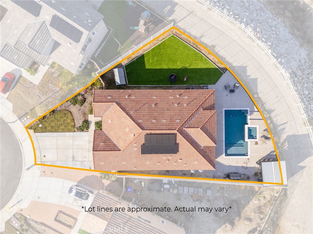 34972 South Serrano Square Yucaipa, CA 92399 - Photo 46 of 48 a view of a building with a small yard