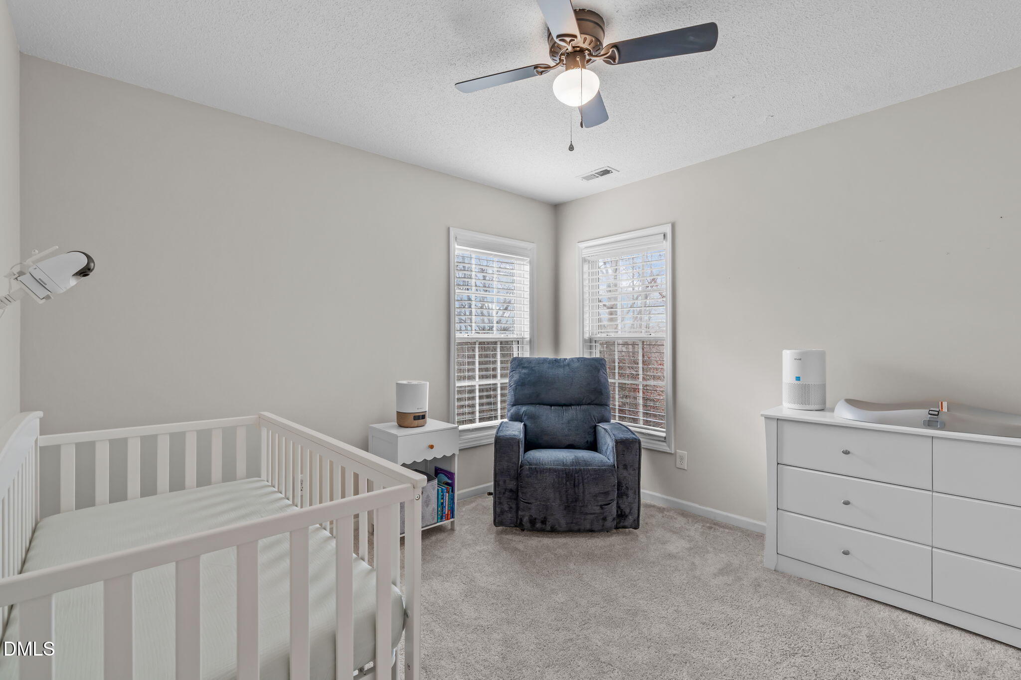 2501 Springfield Park Drive Raleigh, NC 27614 - Photo 25 of 44 a bedroom with furniture and chandelier