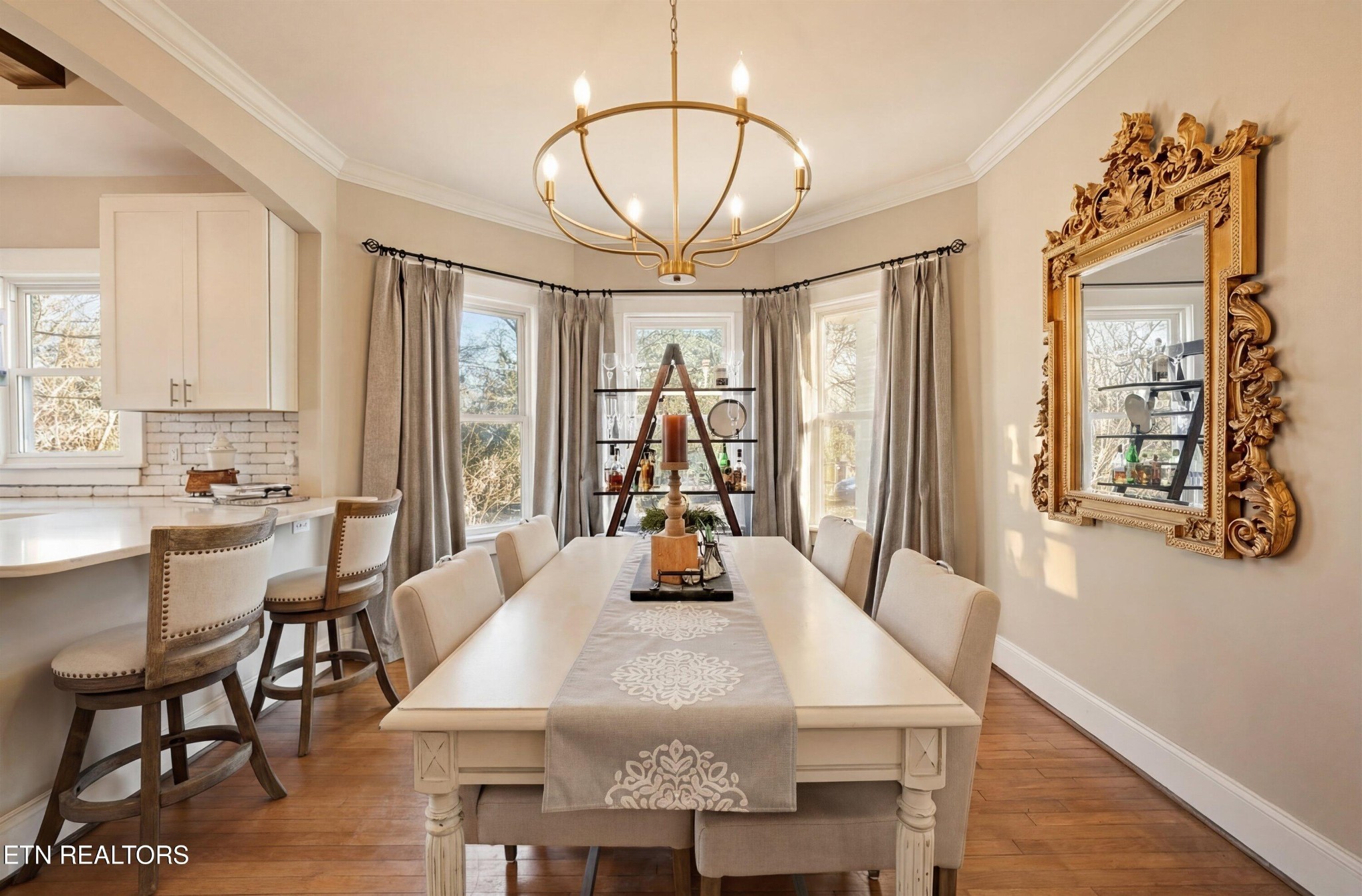 6911 Nubbin Ridge Drive Knoxville, TN 37919 - Photo 16 of 46 a view of a dining room with furniture window and wooden floor