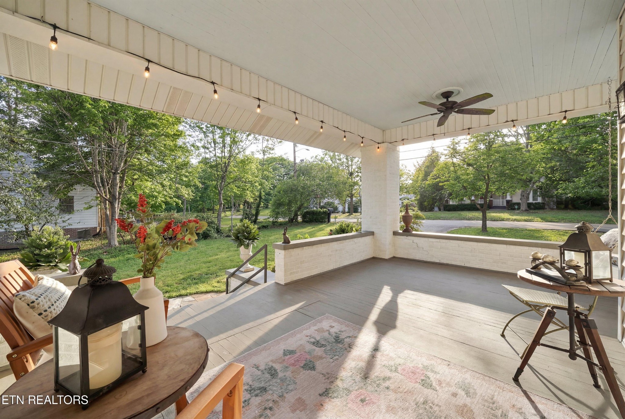 6911 Nubbin Ridge Drive Knoxville, TN 37919 - Photo 2 of 46 a view of a porch with furniture and a yard