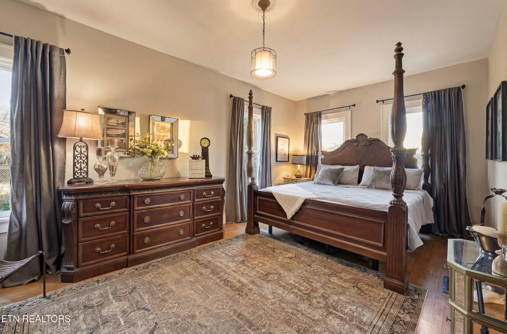 6911 Nubbin Ridge Drive Knoxville, TN 37919 - Photo 24 of 46 a bedroom with a bed and wooden floor
