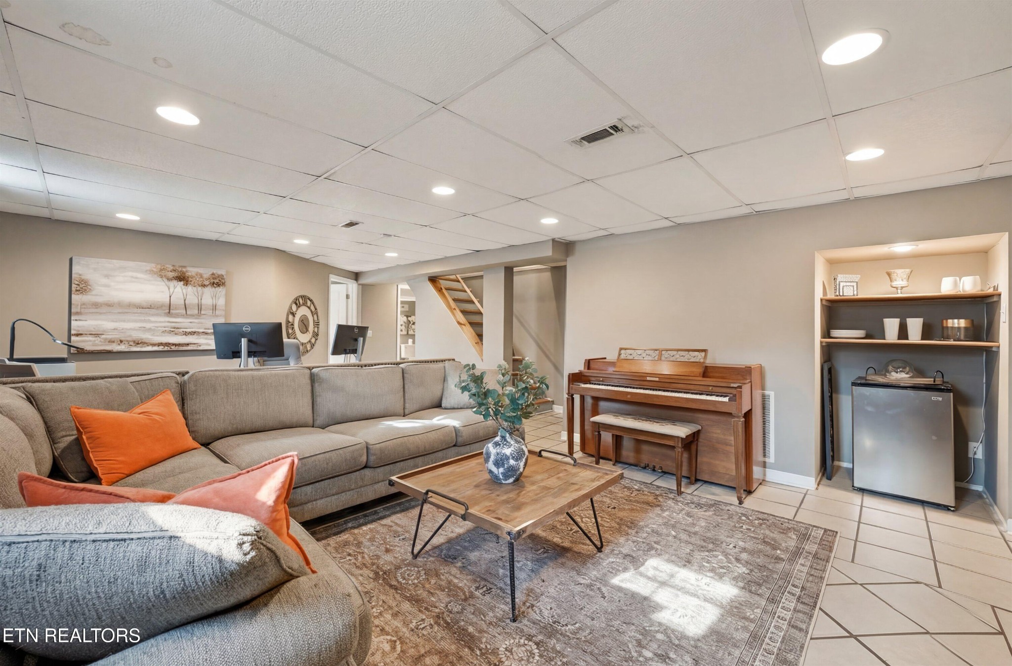 6911 Nubbin Ridge Drive Knoxville, TN 37919 - Photo 28 of 46 a living room with furniture a piano and a piano