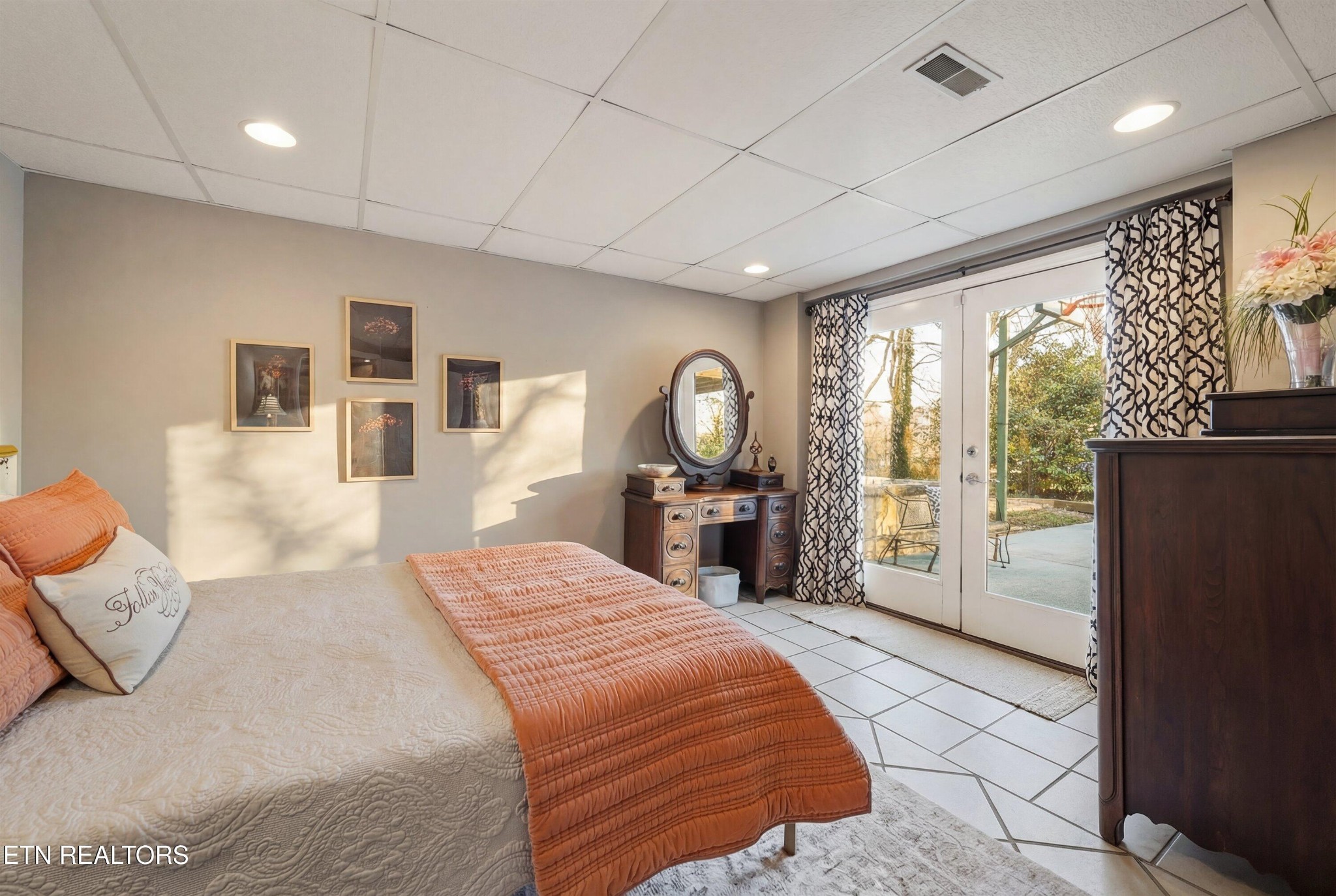 6911 Nubbin Ridge Drive Knoxville, TN 37919 - Photo 29 of 46 a spacious bedroom with a large bed and wooden floor