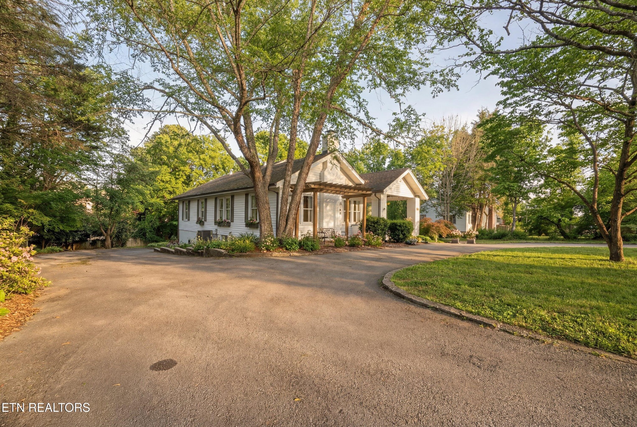 6911 Nubbin Ridge Drive Knoxville, TN 37919 - Photo 40 of 46 a view of a house with a yard