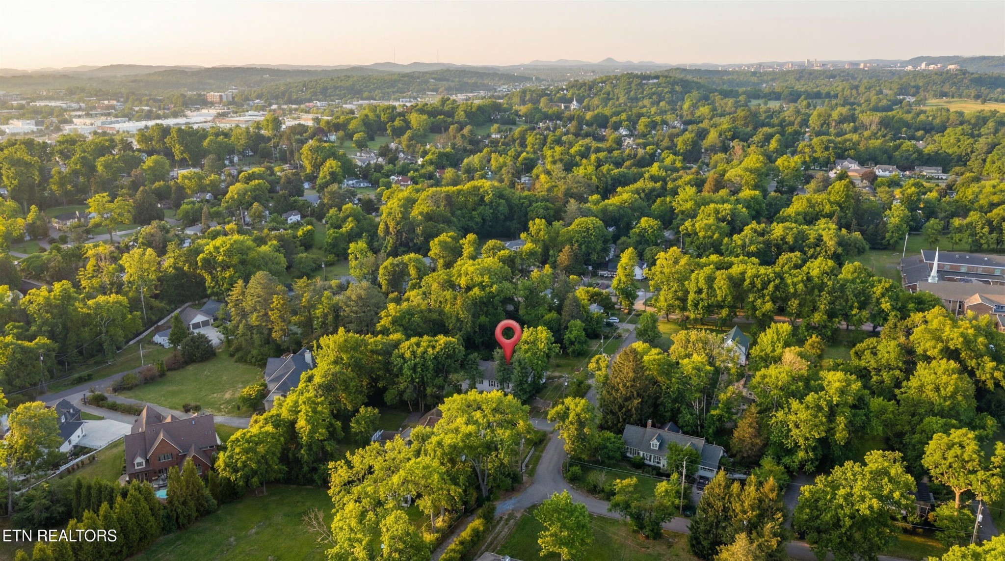 6911 Nubbin Ridge Drive Knoxville, TN 37919 - Photo 44 of 46 a view of a city with mountain