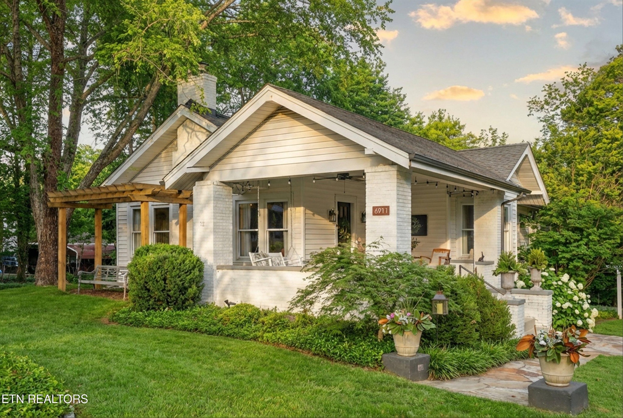6911 Nubbin Ridge Drive Knoxville, TN 37919 - Photo 8 of 46 a view of a house with a yard