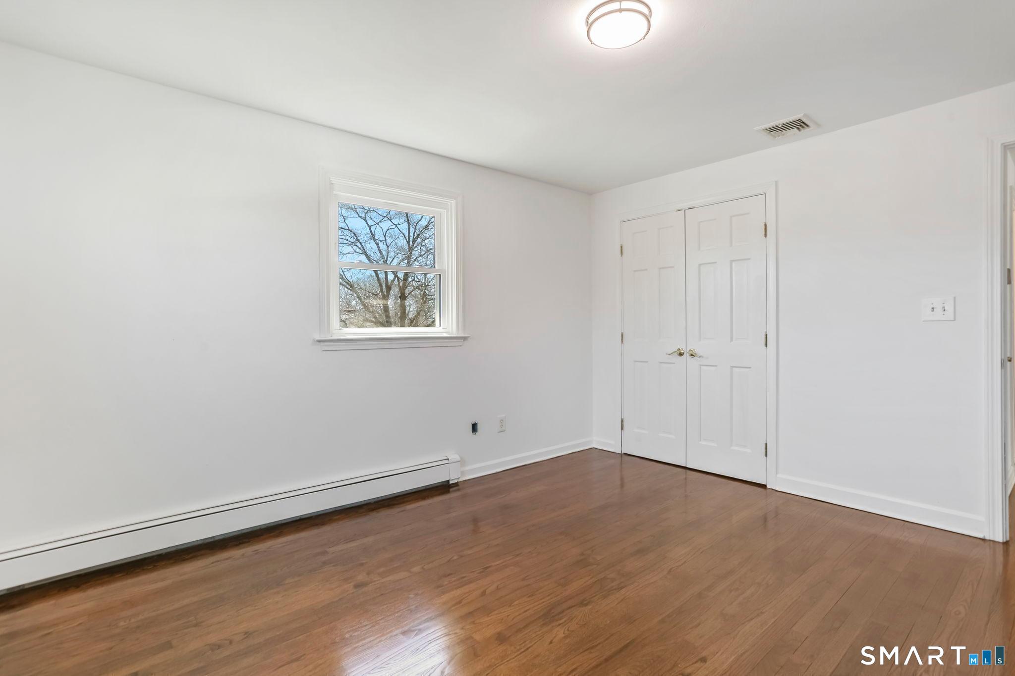 195 Post Oak Road Stratford, CT 06614 - Photo 20 of 32 Second Bedroom with Large Closet