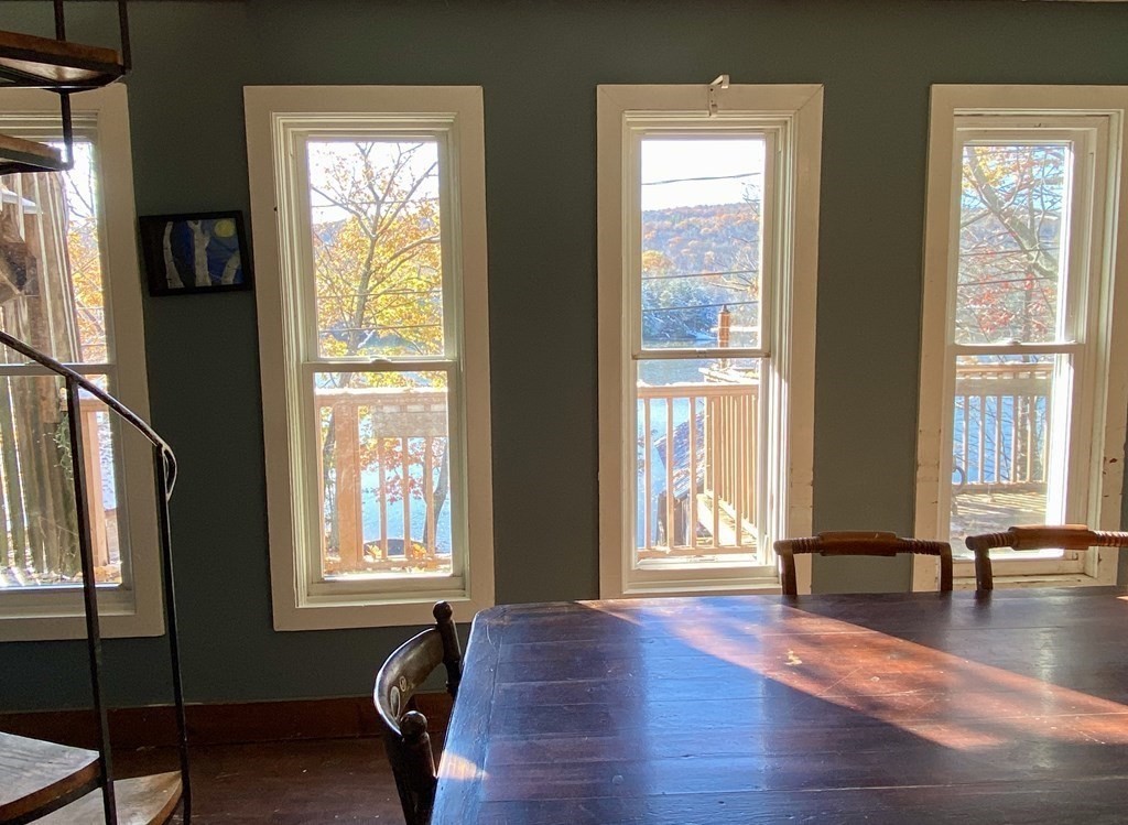 194 Buckland Road Ashfield, MA 01330 - Photo 10 of 19 a view of a livingroom with furniture wooden floor and windows