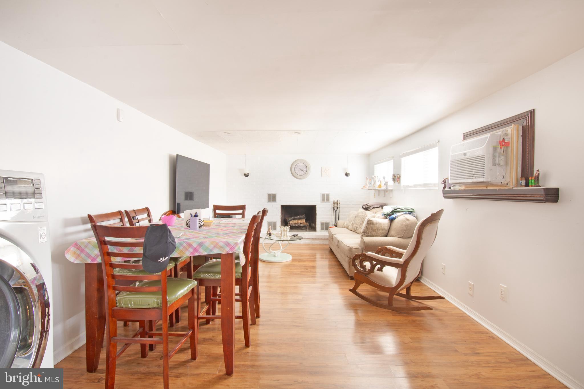 7 Gainor Road New Castle, DE 19720 - Photo 5 of 27 a view of a dining room with furniture and wooden floor