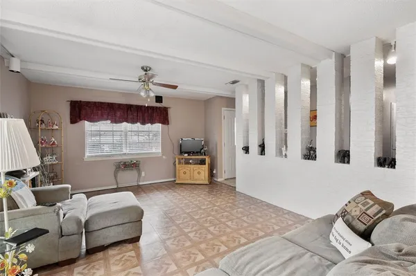 a living room with furniture and a couch