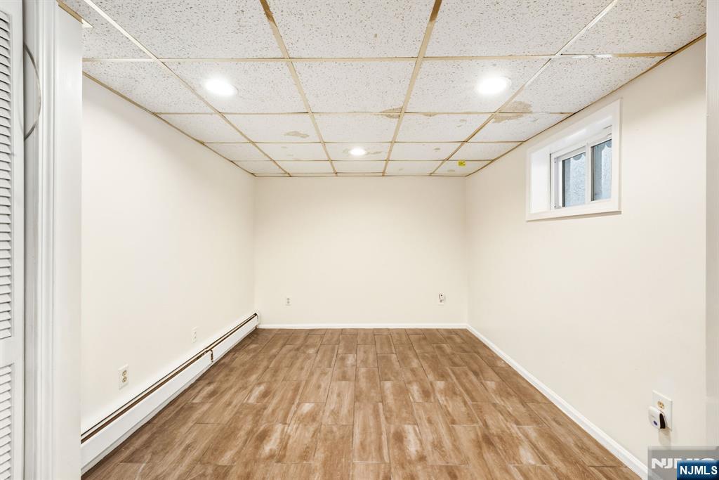 331 Mountain Way Rutherford, NJ 07070 - Photo 34 of 45 a view of a room with wooden floor