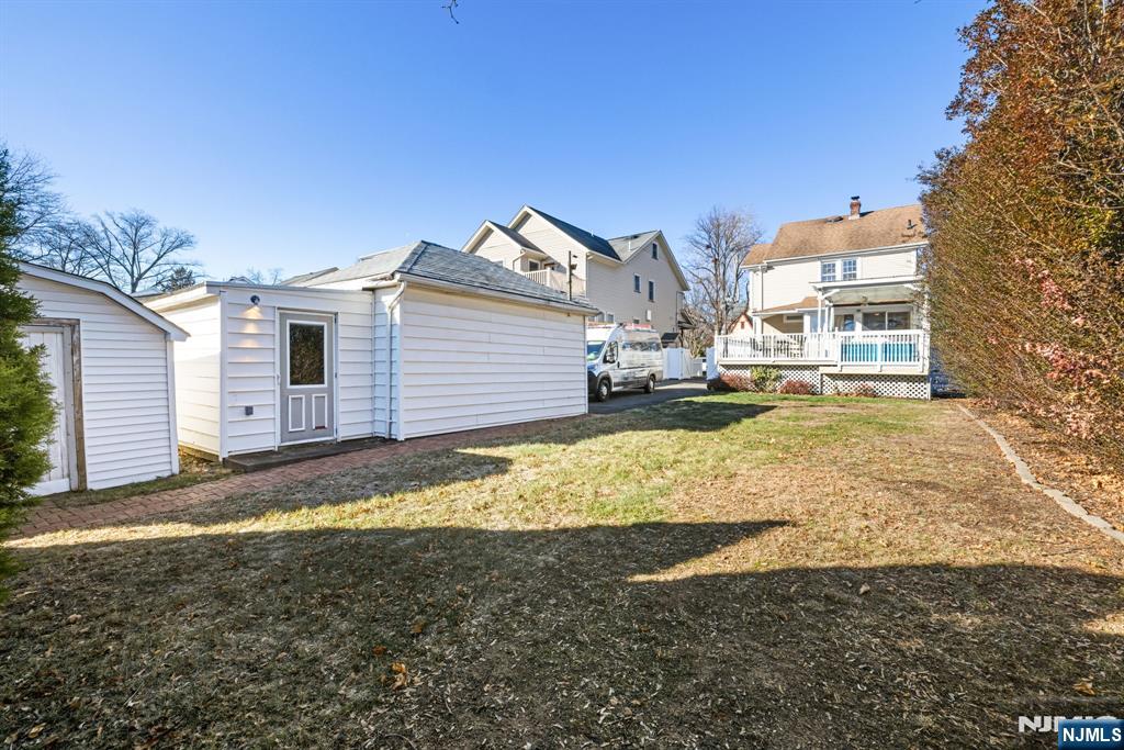 331 Mountain Way Rutherford, NJ 07070 - Photo 41 of 45 a view of a house with a yard