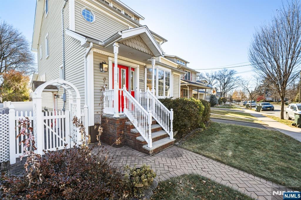 331 Mountain Way Rutherford, NJ 07070 - Photo 44 of 45 a view of a house with a yard